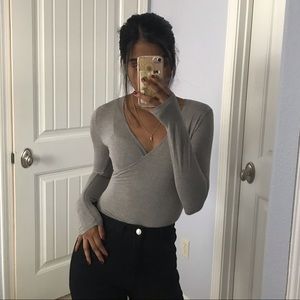 Grey v-neck bodysuit